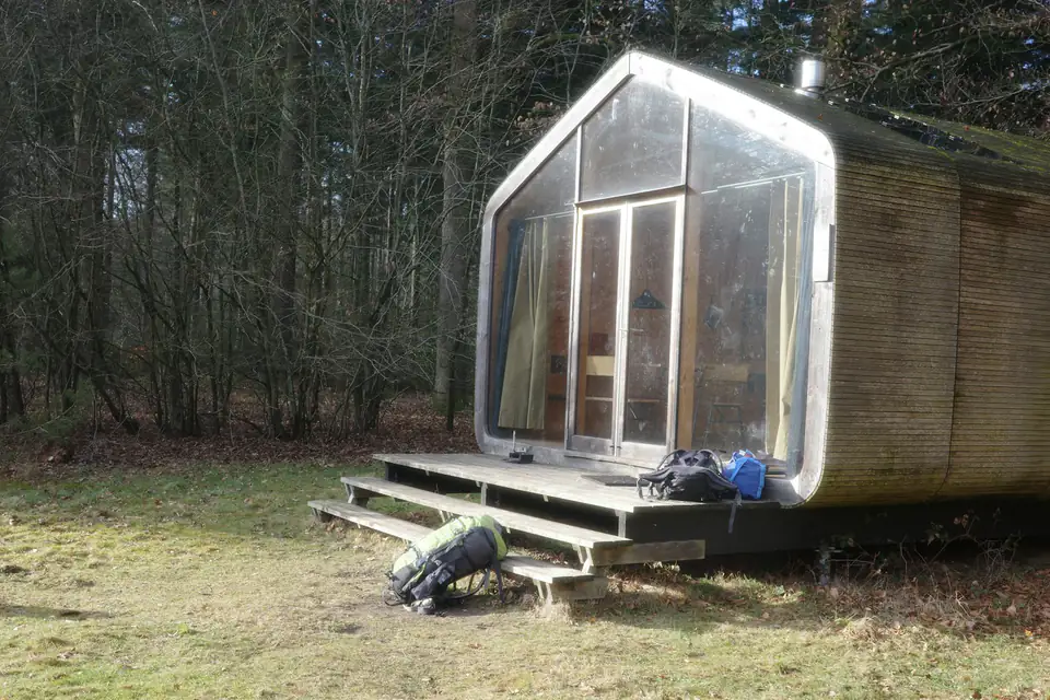 Glass-fronted garden pod, design inspiration for garden rooms in Newcastle Glass-fronted insulated garden room among trees, built for comfort through North East winters